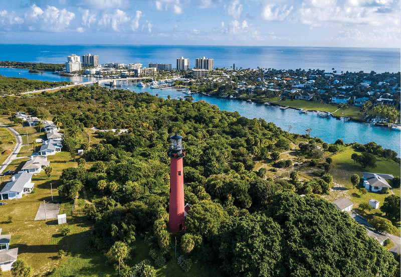 An aerial shot of the Jupiter Inlet Lighthouse